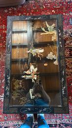 Chinese salontafel, Ophalen