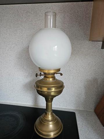 Ancienne lampe à huile, Enlèvement