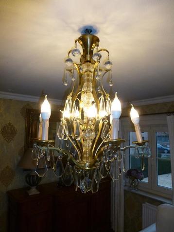 lustre en bronze antique, Enlèvement