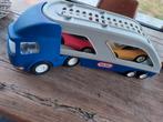 Vrachtwagen met 2 auto's, Ophalen