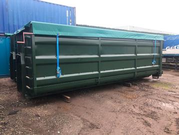 gezette bak met afdekzeil naar de zijkant beschikbaar voor biedingen