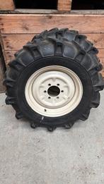 tractorbanden met velg van Kioti ck35, Ophalen