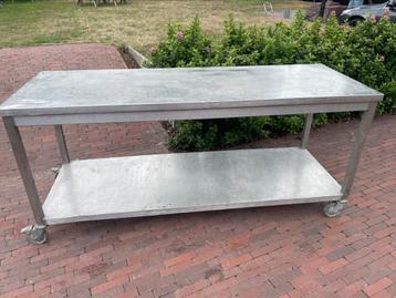 Rvs werktafel op wielen 200x70 beschikbaar voor biedingen