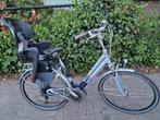 Damesfiets gazelle met stoeltje, Fietsen en Brommers, Ophalen, Zo goed als nieuw, Gazelle