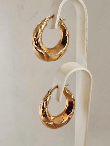 Gouden oorhangers jaren 1950 beschikbaar voor biedingen