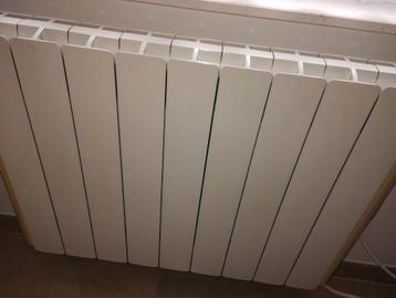 Radiateur a inertie. 1500 kW 2 radiateur+ thermostat  beschikbaar voor biedingen