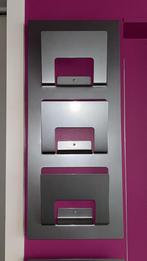 2 porte-revues, Enlèvement