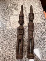Twee houten beeldjes uit Kalimantan, Ophalen