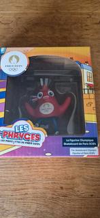 Officieel mascottefiguur van de Olympische Spelen van Frankr, Ophalen