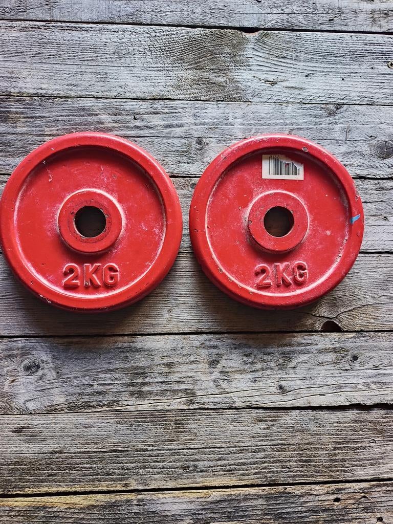 Lot de 2 plaques de poids rouges de 2 kg, 4 kg au total, Enlèvement ou Envoi, Utilisé, Plaques d'haltères