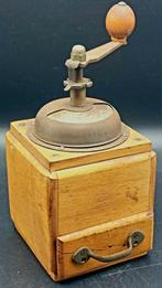 Oude houten koffiemolen, Ophalen
