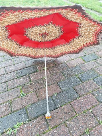 Vintage paraplu beschikbaar voor biedingen