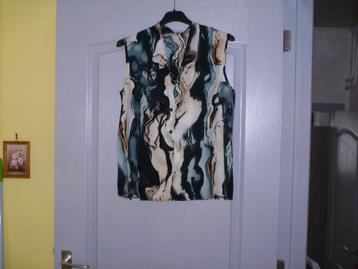 a vendre blouse tunique  beschikbaar voor biedingen