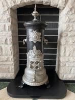 Zwart duiveltje kachel, Ophalen