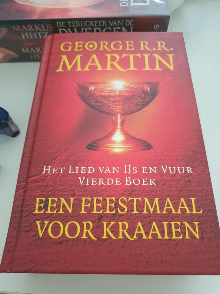 George R.R. Martin - Een feestmaal voor kraaien BOEK 4, Boeken, Fantasy, Zo goed als nieuw, Ophalen of Verzenden