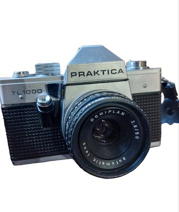 Praktica Super TL100 camera met extra toebehoren  beschikbaar voor biedingen