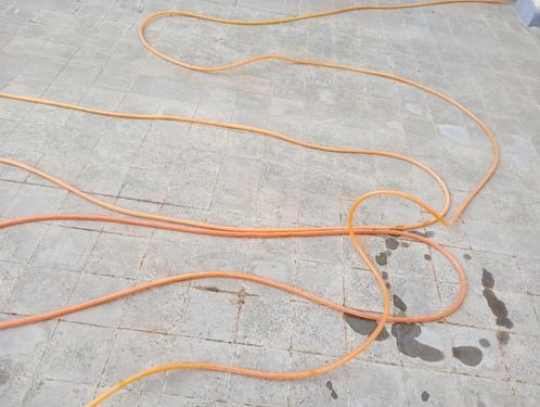 Tuinslang oranje 50meter, Tuin en Terras, Tuinslangen, Gebruikt, Tuinslang, Ophalen