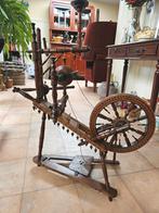 Antiek spinnewiel, Ophalen