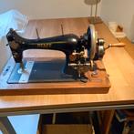 hand naaimachine Pfaff, Ophalen