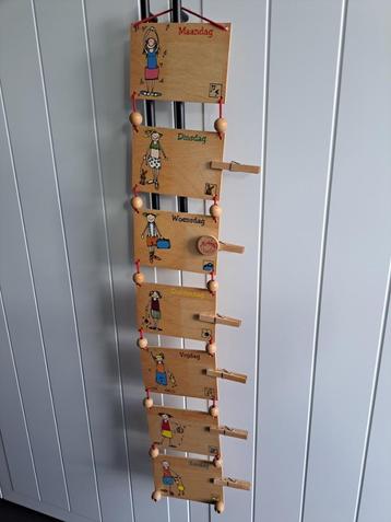 Houten weekkalender Janbibbejan  beschikbaar voor biedingen