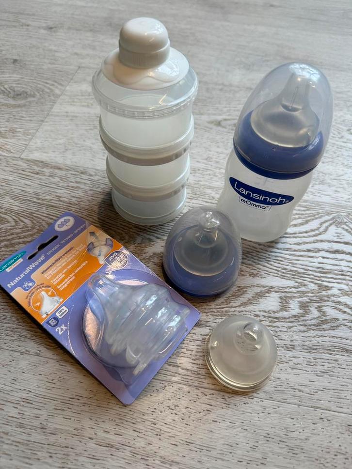 Lansinoh babyflesje met 4 extra zuigspenen en bewaarpotjes, Kinderen en Baby's, Babyvoeding en Toebehoren, Zo goed als nieuw, Ophalen of Verzenden