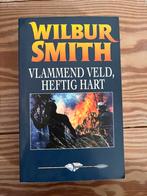Wilbur Smith - Vlammend veld, heftig hart, Ophalen of Verzenden, Zo goed als nieuw, Wilbur Smith