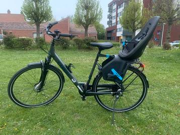 Damesfiets merk trek met stoel kind merk thule  beschikbaar voor biedingen