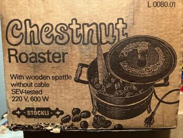 Kastanjeoven met grill beschikbaar voor biedingen