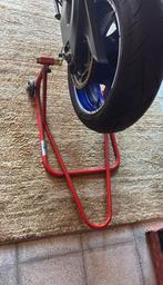 paddock voor en achter, Motoren, Ophalen