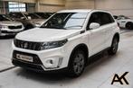 Suzuki Vitara 1.4 Turbo Boosterjet 48V Hybrid Automaat - NAV, Auto's, Suzuki, Stof, Gebruikt, https://public.car-pass.be/vhr/711194e3-c72b-42fc-8652-137d6ee144ca