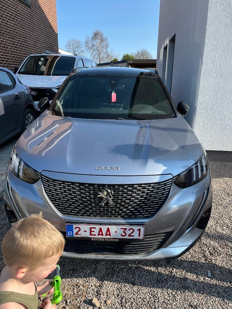 Mooi uitgeruste Peugeot e2008 te koop met lederen interieur, Auto's, Parkeersensor, Zwart, Leder, Elektrisch
