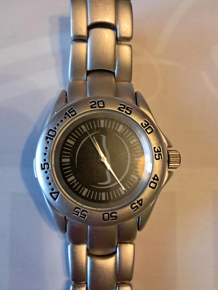 Montre Coca Cola Stainless Steel Back., Bijoux, Sacs & Beauté, Montres | Hommes, Neuf, Acier, Acier, Enlèvement