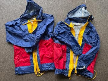 Regenjas vintage blauw rood geel als nieuw jaren 90 beschikbaar voor biedingen