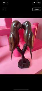 Houte papegaaien, Ophalen