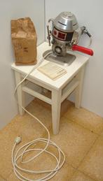 Snij machines Textiel, Ophalen