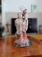 Chinese houten standbeeld, Ophalen