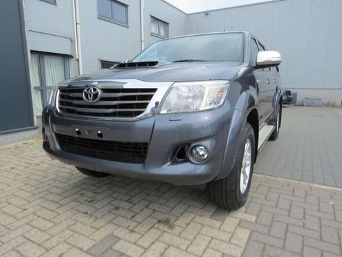 Toyota Hilux 3.0 D-4D 4WD STX AmaZonia (bj 2014, automaat), Auto's, Toyota, Bedrijf, Te koop, Hilux, Lederen bekleding, Metaalkleur