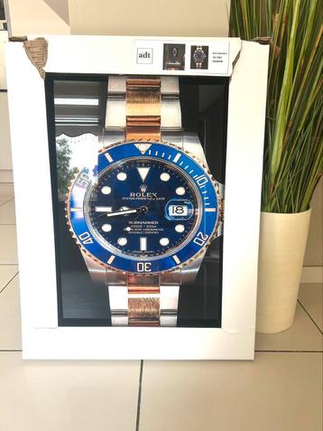 Glasschilderij “Rolex Submariner Blue” beschikbaar voor biedingen