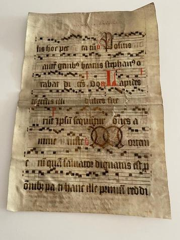 Perkament bladzijde uit oude boek beschikbaar voor biedingen