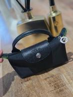 Handtas, Enlèvement, Sac à main