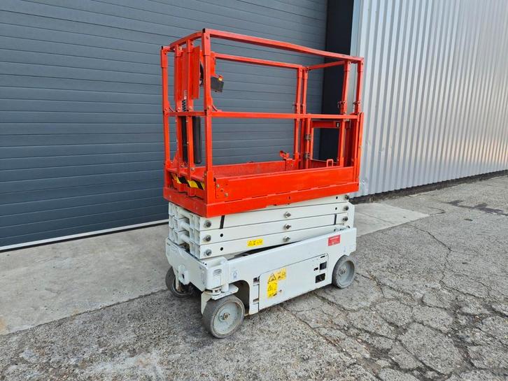 Genie GS1532 schaarlift elektrische hoogwerker, Doe-het-zelf en Bouw, Steigers, Ophalen