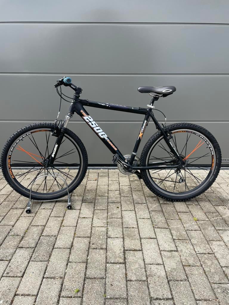 Mountainbike gebruikt maar nog steeds functioneel, Ophalen, Gebruikt