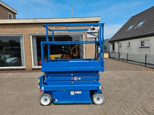 Skyjack 3219 hoogwerker schaarlift 120 uur ! Frisse accu's, Zakelijke goederen, Machines en Bouw | Liften, Steigers en Ladders