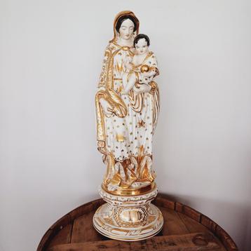 Antieke Madonna met kind in het oude Brussel. Rond 1830-1850