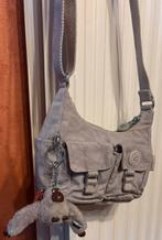 Kipling tasje met dubbel aapje,lange riem., Ophalen of Verzenden, Gebruikt, Overige kleuren, Schoudertasje