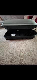 Auto dakkoffer, Ophalen