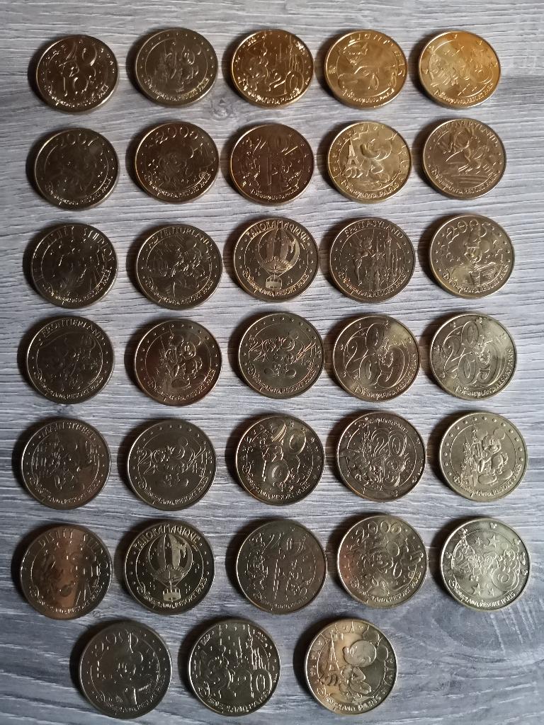 Lotje van 33 verzamelmunten Disneyland, Ophalen