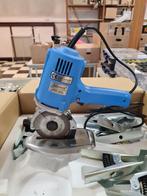 electrische stoffensnijmachine, Ophalen
