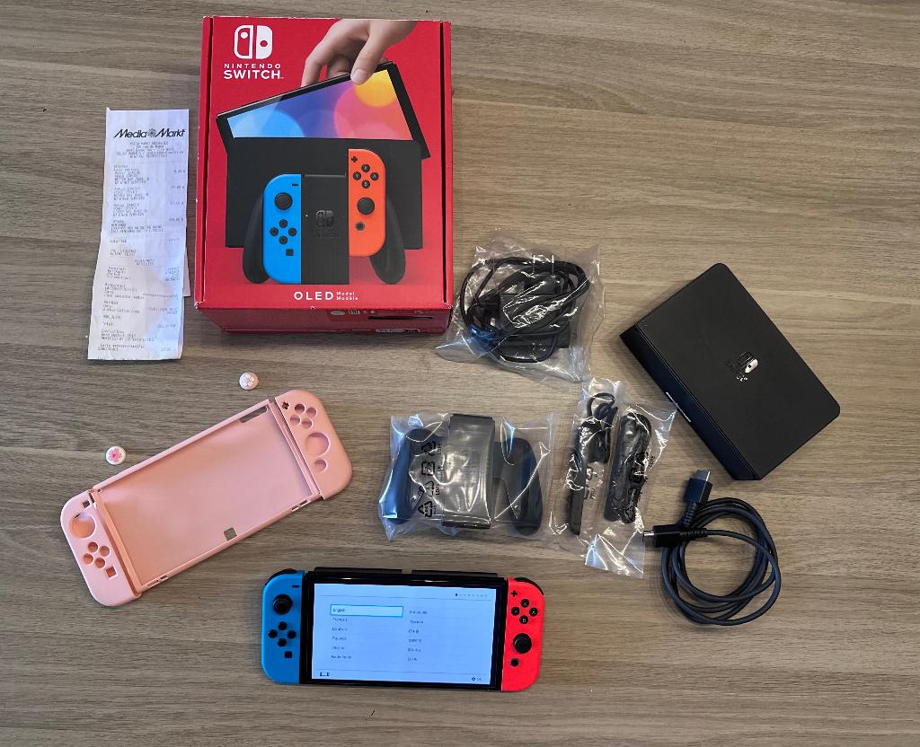 Nintendo Switch Oled sous garentie, Consoles de jeu & Jeux vidéo, Enlèvement, Comme neuf, Avec 2 manettes, Switch OLED