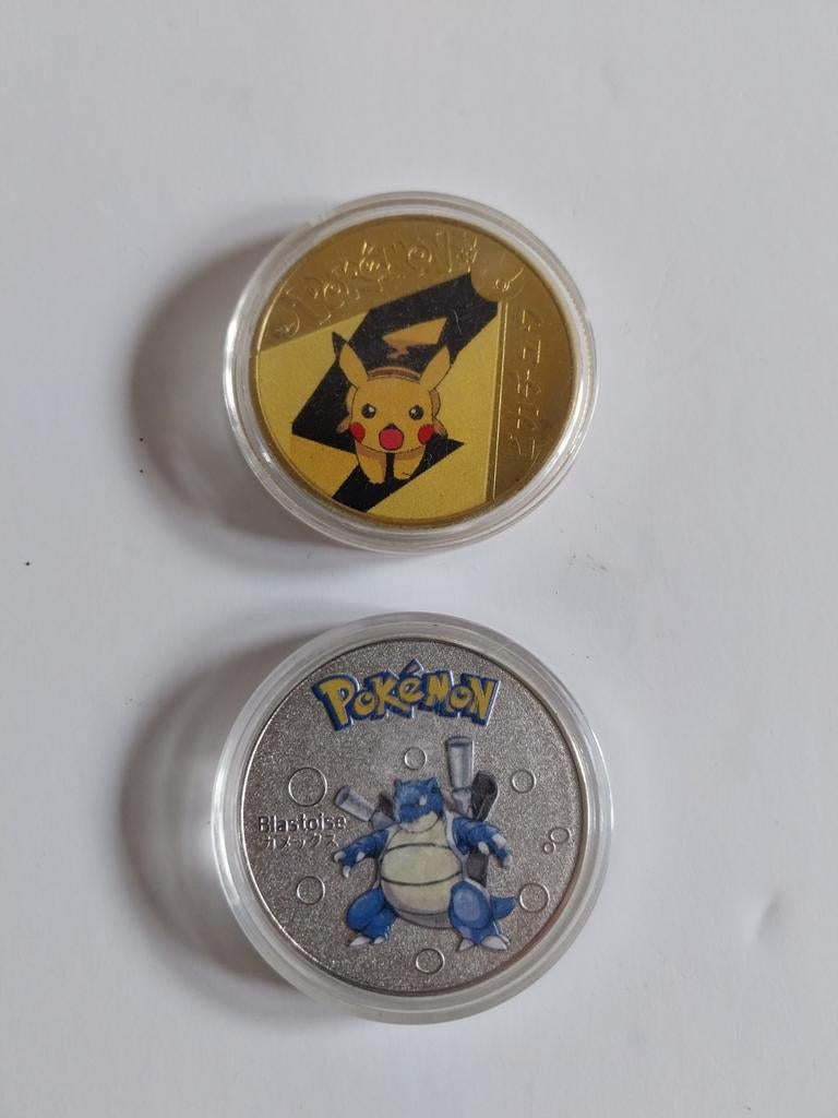 Pokémon munten angry pikachu blastoise, Ophalen of Verzenden